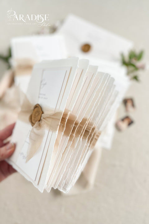 Announce your special day with understated elegance and personal charm. This earthen neutral wedding stationery collection is crafted to celebrate your love story with a refined, organic feel. Each invitation is a personalised handmade invite, featuring your unique details on our premium, artisan paper. The soft, neutral tones create a timeless and tranquil aesthetic, perfectly complemented by the gentle hue of the "Natural" accent color.