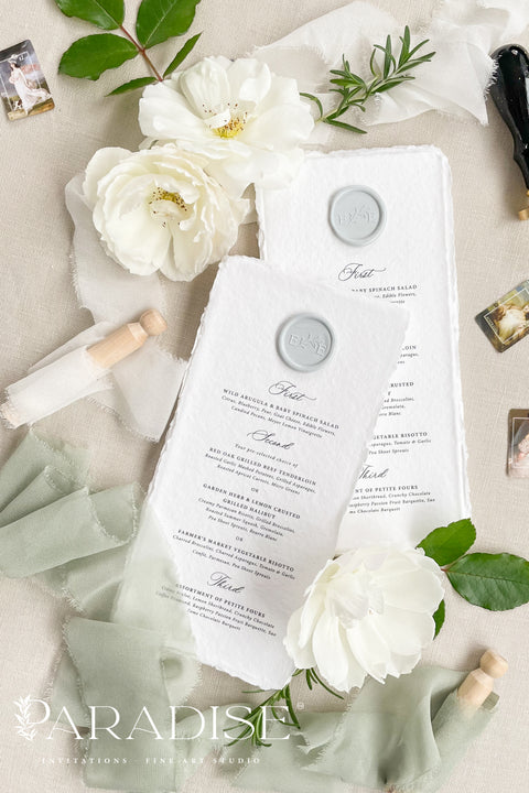 These handmade paper wedding menus exude timeless refinement and artisanal charm, designed to bring a touch of romance to your wedding tablescape. Each menu is crafted from luxurious 100% cotton rag paper, known for its soft texture and naturally deckled edges, offering an organic yet elegant finish. The menus feature classic black typography paired with a custom wax seal in soft gray, perfectly balancing simplicity and sophistication. 