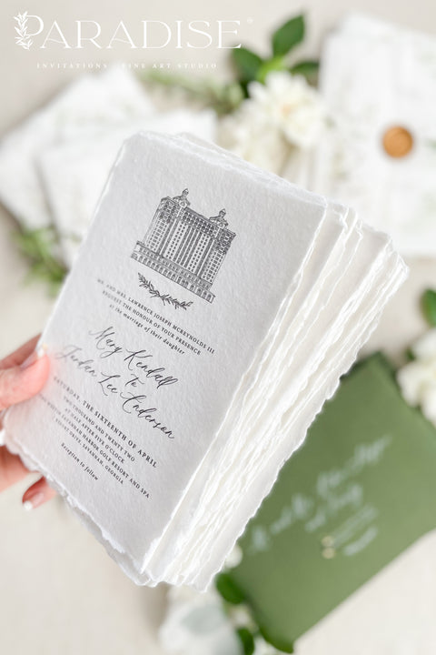 For couples who adore organic beauty and timeless detail, this handmade paper wedding invitation suite captures the essence of fine art stationery. The hand-drawn venue illustration is the centerpiece - a bespoke sketch that celebrates your love story and the place where it begins. Printed on thick, luxury cotton paper, its natural deckled edges and soft texture bring warmth and authenticity to every invitation. Wrapped in a floral vellum jacket and finished with a warm gold wax seal.