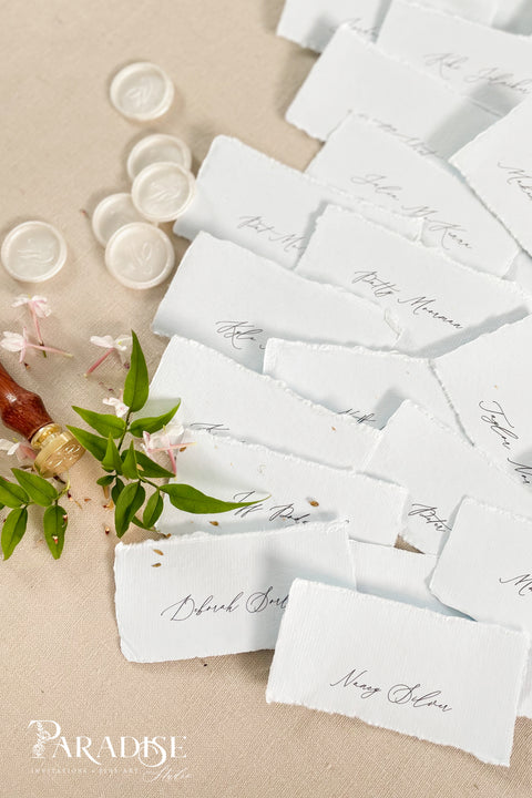Add soft color and fine-art elegance to your event with our colored handmade paper place cards, crafted from luxurious cotton rag paper and finished with naturally torn deckled edges. Each card features refined calligraphy and a subtle organic texture, creating a beautifully romantic detail perfect for weddings, showers, rehearsal dinners, or elevated celebrations. Their artisanal feel and pastel tones bring charm, sophistication, and warmth to any tablescape.