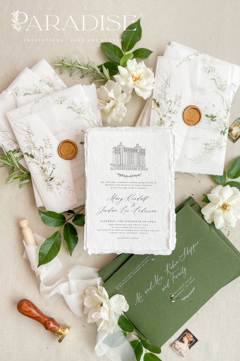 For couples who adore organic beauty and timeless detail, this handmade paper wedding invitation suite captures the essence of fine art stationery. The hand-drawn venue illustration is the centerpiece - a bespoke sketch that celebrates your love story and the place where it begins. Printed on thick, luxury cotton paper, its natural deckled edges and soft texture bring warmth and authenticity to every invitation. Wrapped in a floral vellum jacket and finished with a warm gold wax seal.