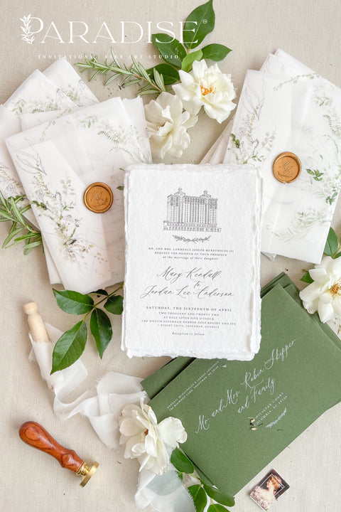 For couples who adore organic beauty and timeless detail, this handmade paper wedding invitation suite captures the essence of fine art stationery. The hand-drawn venue illustration is the centerpiece - a bespoke sketch that celebrates your love story and the place where it begins. Printed on thick, luxury cotton paper, its natural deckled edges and soft texture bring warmth and authenticity to every invitation. Wrapped in a floral vellum jacket and finished with a warm gold wax seal.