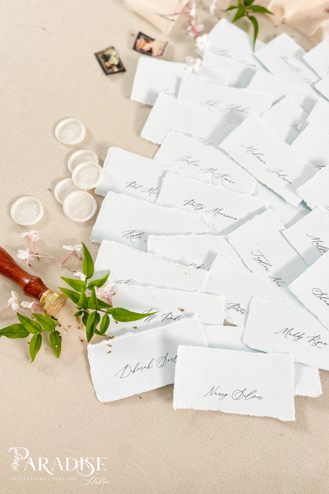 Add soft color and fine-art elegance to your event with our colored handmade paper place cards, crafted from luxurious cotton rag paper and finished with naturally torn deckled edges. Each card features refined calligraphy and a subtle organic texture, creating a beautifully romantic detail perfect for weddings, showers, rehearsal dinners, or elevated celebrations. Their artisanal feel and pastel tones bring charm, sophistication, and warmth to any tablescape.