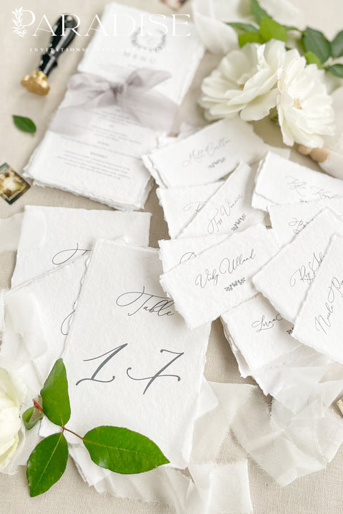 These handmade paper table numbers add a refined, elevated touch to your wedding tablescape. Premium cotton paper, soft deckled edges, and minimalist calligraphy create a timeless fine-art look that pairs beautifully with classic, organic, or modern wedding styles. Their natural texture and airy aesthetic make them perfect for capturing unforgettable reception detail shots.