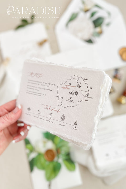 Announce your wedding with refined botanical charm through this handmade paper wedding invitation suite, adorned with vellum wraps featuring watercolor botanical artwork and a custom hand-drawn map that beautifully tells your story. Each invitation is printed on luxury deckled-edge cotton paper, offering a soft, organic texture that captures the essence of fine art craftsmanship. The botanical vellum jacket adds a touch of delicate transparency.