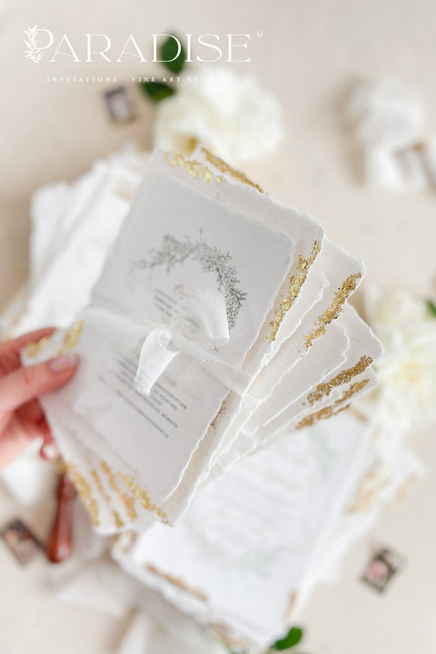 Announce your summer celebration with the perfect blend of bohemian charm and elegant sophistication with these exquisite wedding invitations. The unique wreath design adds a touch of natural beauty, while the delicate golden leaf detail provides a subtle, luxurious shimmer. This boho chic stationery is perfect for a laid-back, romantic summer wedding, setting a warm and inviting tone for your guests.