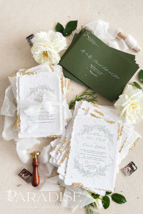 Announce your summer celebration with the perfect blend of bohemian charm and elegant sophistication with these exquisite wedding invitations. The unique wreath design adds a touch of natural beauty, while the delicate golden leaf detail provides a subtle, luxurious shimmer. This boho chic stationery is perfect for a laid-back, romantic summer wedding, setting a warm and inviting tone for your guests.