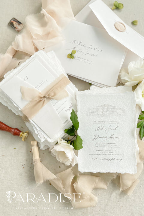 Refined, personal, and beautifully timeless - our handmade wedding invitation suite with a hand-drawn venue illustration transforms your wedding stationery into a piece of art. Each invitation is printed on 100% cotton deckled-edge paper, tied with a soft taupe silk ribbon, and sealed with an ivory wax seal for a sophisticated, heirloom finish. The custom venue sketch captures the heart of your celebration. 