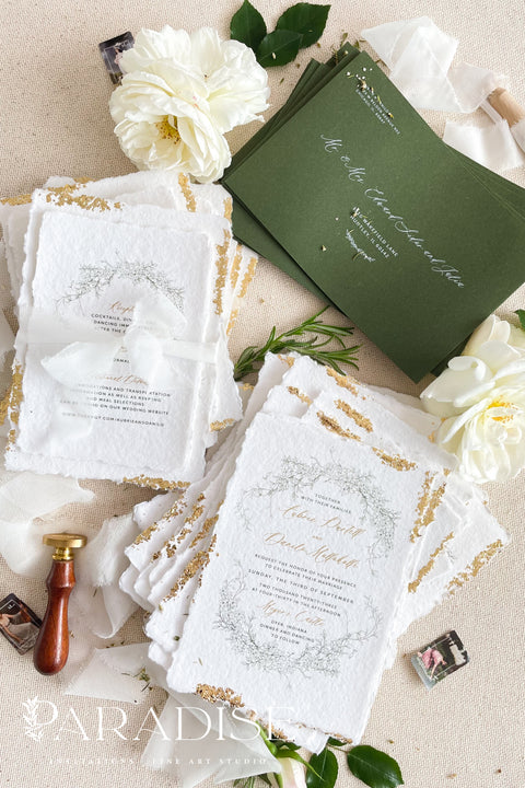 Announce your summer celebration with the perfect blend of bohemian charm and elegant sophistication with these exquisite wedding invitations. The unique wreath design adds a touch of natural beauty, while the delicate golden leaf detail provides a subtle, luxurious shimmer. This boho chic stationery is perfect for a laid-back, romantic summer wedding, setting a warm and inviting tone for your guests.