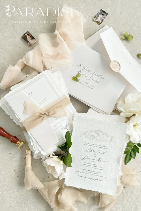 Refined, personal, and beautifully timeless - our handmade wedding invitation suite with a hand-drawn venue illustration transforms your wedding stationery into a piece of art. Each invitation is printed on 100% cotton deckled-edge paper, tied with a soft taupe silk ribbon, and sealed with an ivory wax seal for a sophisticated, heirloom finish. The custom venue sketch captures the heart of your celebration. 