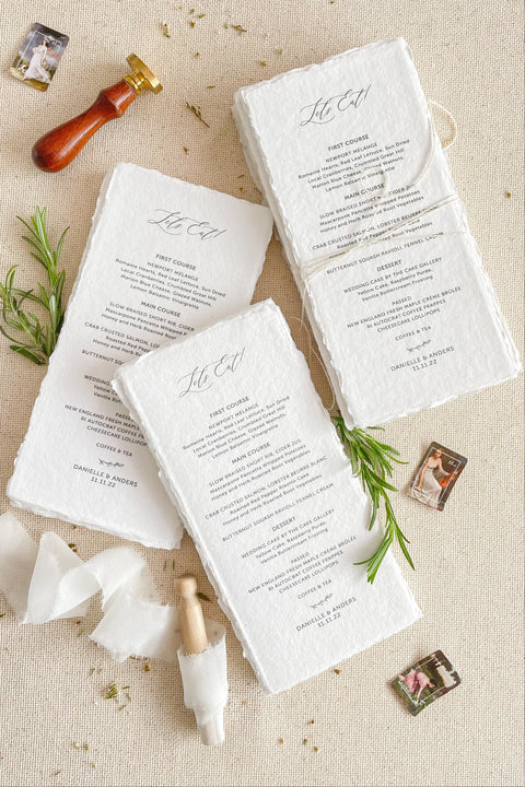 Bring artisanal beauty to your tablescape with our handmade paper wedding menus, crafted from 100% cotton rag paper and finished with elegant deckled edges. Each menu is a tactile piece of fine-art stationery, designed for couples who love timeless details and refined simplicity. Perfect for luxury, romantic, or destination weddings, these menus feature minimalist typography printed on naturally textured paper, adding warmth and sophistication to your reception.