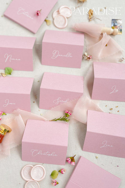 Add a modern pop of color to your event with our colored paper place cards, crafted from premium heavyweight cardstock and folded for a polished, freestanding design. Each card features elegant calligraphy in a soft contrasting tone, making them perfect for weddings, bridal showers, birthdays, baby showers, and stylish celebrations. These vibrant place cards bring personality, charm, and a refined touch to your tablescape while remaining beautifully cohesive with contemporary event aesthetics.