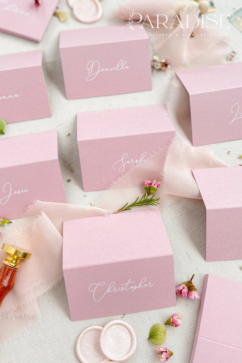 Add a modern pop of color to your event with our colored paper place cards, crafted from premium heavyweight cardstock and folded for a polished, freestanding design. Each card features elegant calligraphy in a soft contrasting tone, making them perfect for weddings, bridal showers, birthdays, baby showers, and stylish celebrations. These vibrant place cards bring personality, charm, and a refined touch to your tablescape while remaining beautifully cohesive with contemporary event aesthetics.