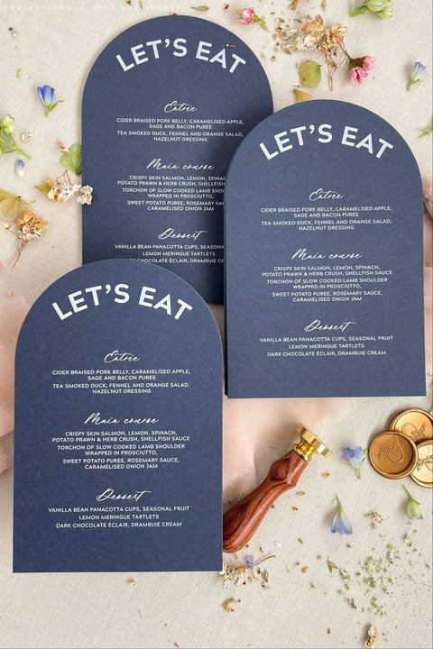 Make a bold design statement with our arched wedding menus, crafted for couples who love modern elegance and clean design. Printed on luxury cardstock with smooth matte or textured finishes, each arched menu features refined typography and a playful, contemporary silhouette that transforms any tablescape into a modern masterpiece. Perfect for minimalist weddings, modern receptions, or chic garden celebrations, these menus blend creativity and sophistication effortlessly. 