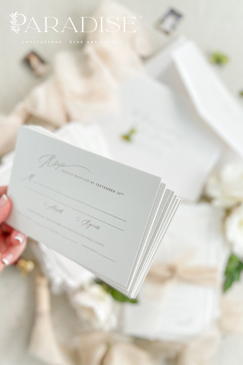 Refined, personal, and beautifully timeless - our handmade wedding invitation suite with a hand-drawn venue illustration transforms your wedding stationery into a piece of art. Each invitation is printed on 100% cotton deckled-edge paper, tied with a soft taupe silk ribbon, and sealed with an ivory wax seal for a sophisticated, heirloom finish. The custom venue sketch captures the heart of your celebration. 