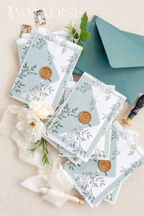 Romantic, refined, and inspired by nature - our botanical vellum wedding invitations are crafted for couples who love timeless design with an organic touch. Each invitation features delicate greenery illustrations, wrapped in a translucent vellum sleeve and sealed with a gold wax seal for an elegant, fine art finish. The deep emerald and sage green envelopes perfectly complement the natural botanical design.