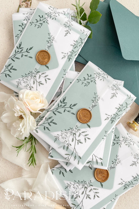Romantic, refined, and inspired by nature - our botanical vellum wedding invitations are crafted for couples who love timeless design with an organic touch. Each invitation features delicate greenery illustrations, wrapped in a translucent vellum sleeve and sealed with a gold wax seal for an elegant, fine art finish. The deep emerald and sage green envelopes perfectly complement the natural botanical design.