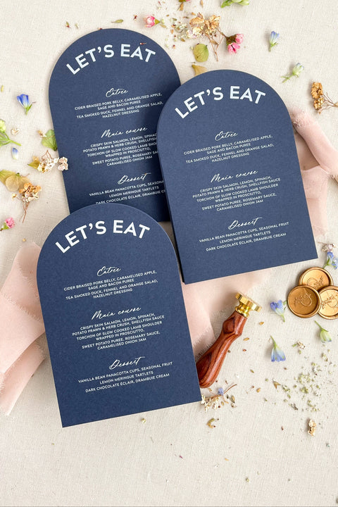 Make a bold design statement with our arched wedding menus, crafted for couples who love modern elegance and clean design. Printed on luxury cardstock with smooth matte or textured finishes, each arched menu features refined typography and a playful, contemporary silhouette that transforms any tablescape into a modern masterpiece. Perfect for minimalist weddings, modern receptions, or chic garden celebrations, these menus blend creativity and sophistication effortlessly. 