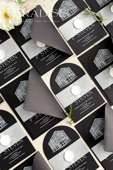 Bold, elegant, and full of character - our arched wedding invitation suite is designed for couples who want to make a statement. Printed on luxurious black cardstock, each invitation features a hand-drawn illustration of your wedding venue, adding a deeply personal and artistic touch to your stationery. Wrapped in a vellum belly band and finished with a white wax seal, this suite blends modern sophistication with timeless craftsmanship.