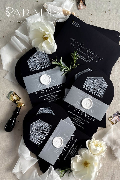 Bold, elegant, and full of character - our arched wedding invitation suite is designed for couples who want to make a statement. Printed on luxurious black cardstock, each invitation features a hand-drawn illustration of your wedding venue, adding a deeply personal and artistic touch to your stationery. Wrapped in a vellum belly band and finished with a white wax seal, this suite blends modern sophistication with timeless craftsmanship.