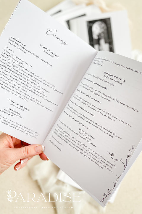 A beautifully printed ceremony program featuring your favorite photograph, wrapped in soft chiffon ribbon and crafted on luxurious fine-art paper. The design blends modern minimalism with heartfelt storytelling - allowing your guests to step into your love story the moment they take their seat. With its elegant typography, timeless black-and-white imagery, and heirloom-quality materials, it becomes more than a program - it becomes a cherished keepsake of your day.