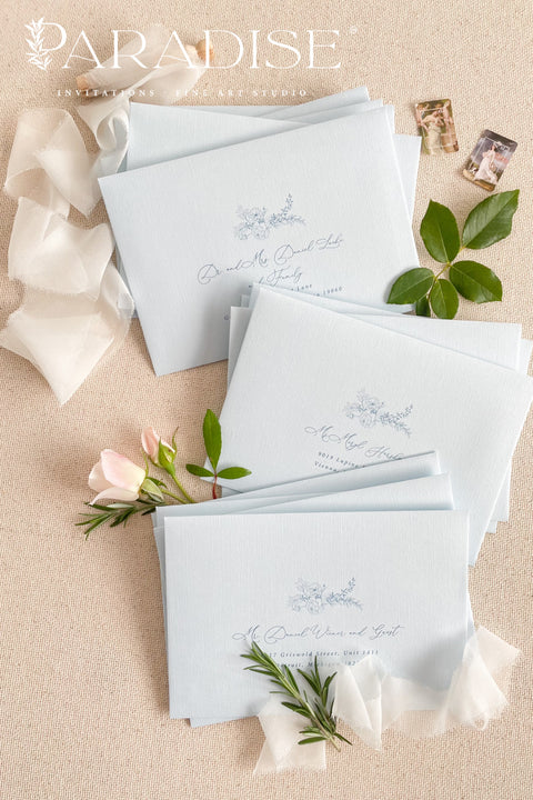 Coco linen wedding envelopes with professional address printing, showing linen texture, soft neutral color, and refined typography for fine art stationery.