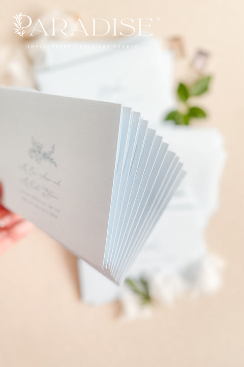 Coco linen wedding envelopes with professional address printing, showing linen texture, soft neutral color, and refined typography for fine art stationery.