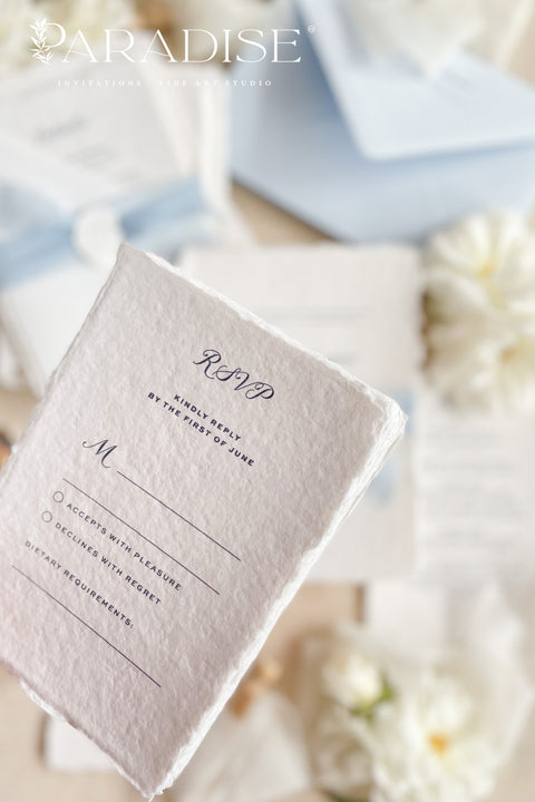 Elegant, romantic, and handmade with love - our fine art wedding invitation suite is crafted from luxury cotton deckled-edge paper and finished with a delicate powder blue chiffon ribbon and white wax seal. The soft blue tones and artisanal textures make this suite perfect for fine art, coastal, or destination weddings, offering a serene yet refined aesthetic that feels effortlessly graceful.