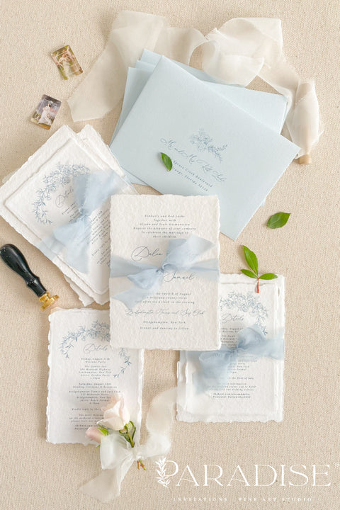 Announce your special day with timeless, heartfelt style. This botanical wedding invitation suite is crafted on our signature, luxurious handmade paper, made from 100% recycled cotton rag. The unique deckled edges and soft texture provide an artisan feel that is both rustic and elegant, setting a deeply romantic tone for your ceremony. Featuring delicate botanical illustrations, each invite is an eco-friendly choice that leaves a lasting impression on your guests.