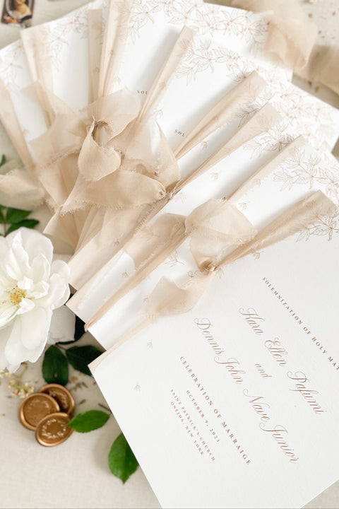 Warm, romantic, and refined - these wedding programs feature soft botanical illustrations paired with delicate chiffon ribbon for a timeless ceremony keepsake. Printed on premium cardstock with elegant typography, they bring an elevated aesthetic to your aisle décor. Perfect for classic, floral, and fine-art inspired weddings.