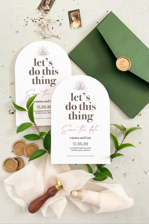 Announce your big day with personality and charm through our arched Save the Date cards, featuring the playful phrase in bold modern typography. Printed on luxury fine-art cardstock with a sleek arched silhouette, these cards perfectly blend sophistication with a fun, contemporary edge. Designed for couples who want to make a memorable first impression, this Save the Date is ideal for modern, chic, and creative weddings.