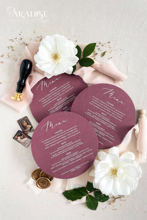 Elevate your reception styling with our burgundy circle wedding menus, designed to blend modern elegance with romantic depth. Printed on luxury matte cardstock in a rich wine shade, these round menus make a stunning statement at each place setting. Their clean, minimalist layout and distinctive shape create a refined aesthetic perfect for autumn soirées, vineyard weddings, or fine-art celebrations.
