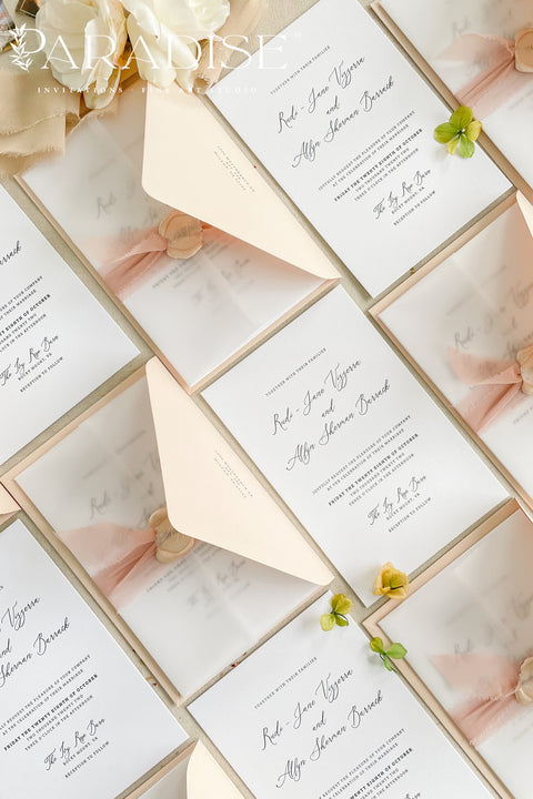 Delicate, romantic, and effortlessly graceful - this letterpress wedding invitation suite blends modern minimalism with artisanal charm. Each piece is crafted on thick, premium cotton paper, with deep letterpress impressions that capture the poetry of fine stationery. Wrapped in translucent vellum, tied with a blush silk ribbon, and finished with a wax seal, this suite is designed for couples who appreciate sophistication in every detail.