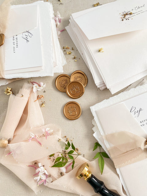 Announce your special day with understated elegance and personal charm. This earthen neutral wedding stationery collection is crafted to celebrate your love story with a refined, organic feel. Each invitation is a personalised handmade invite, featuring your unique details on our premium, artisan paper. The soft, neutral tones create a timeless and tranquil aesthetic, perfectly complemented by the gentle hue of the "Natural" accent color.