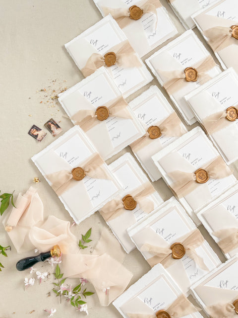 Announce your special day with understated elegance and personal charm. This earthen neutral wedding stationery collection is crafted to celebrate your love story with a refined, organic feel. Each invitation is a personalised handmade invite, featuring your unique details on our premium, artisan paper. The soft, neutral tones create a timeless and tranquil aesthetic, perfectly complemented by the gentle hue of the "Natural" accent color.